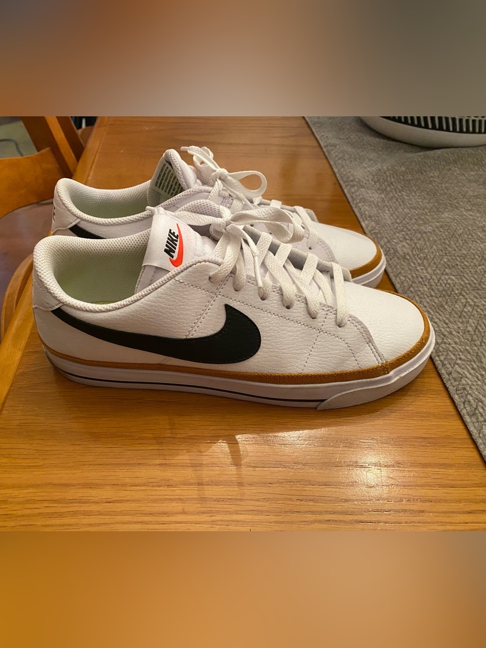 Nike Women’s  White Sneakers with Black Swoosh and Brown Trim